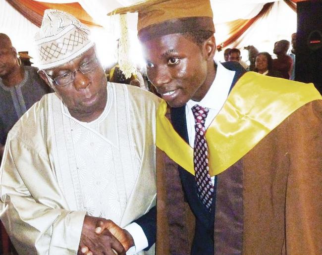 Former-President-Olusegun-Obasanjo-left-with-the-best-graduating-student-Oluwaseun-Afolayan-at-the-event.-1024x811